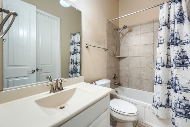 bathroom featuring a textured wall, vanity, toilet, and shower / tub combo with curtain