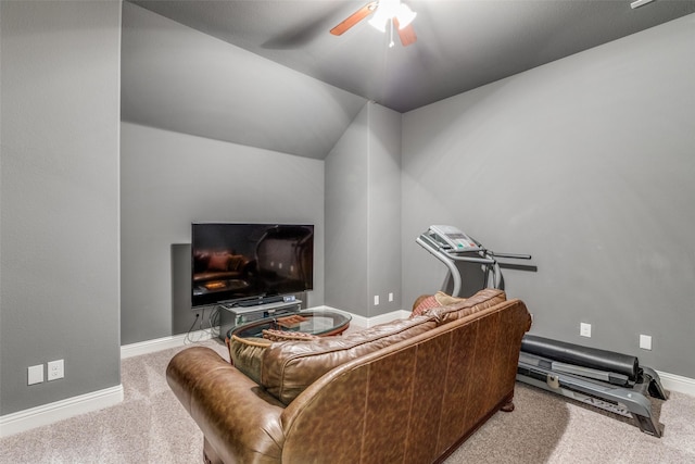 carpeted living room with lofted ceiling, a ceiling fan, and baseboards