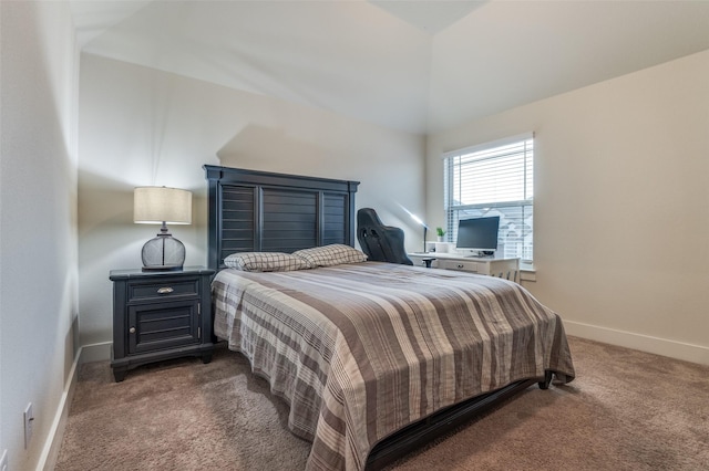 carpeted bedroom featuring baseboards