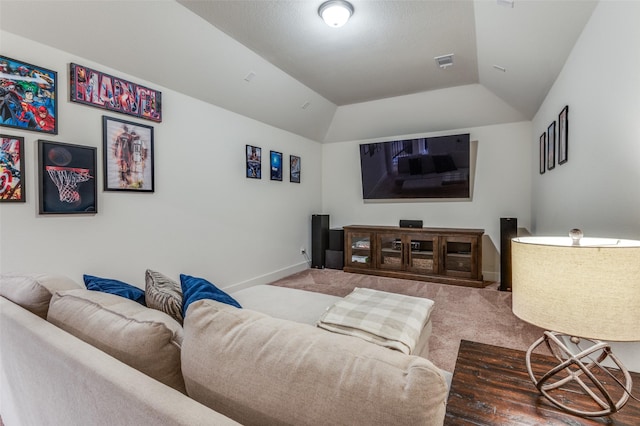 carpeted living room featuring lofted ceiling, baseboards, and visible vents