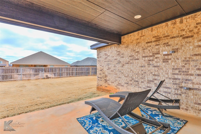 view of patio with fence