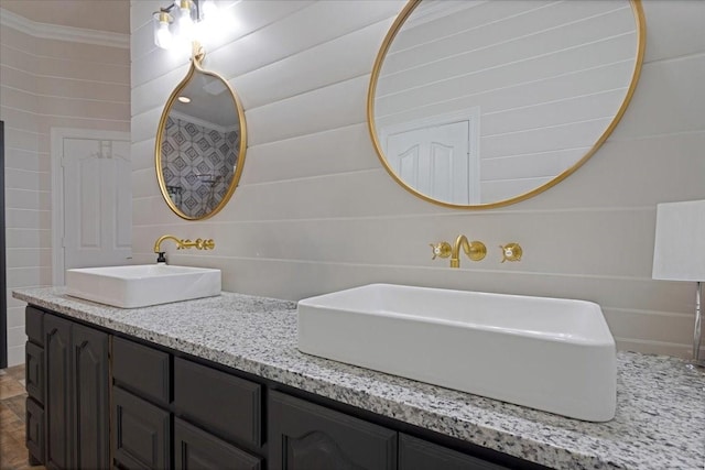 full bath featuring double vanity and a sink