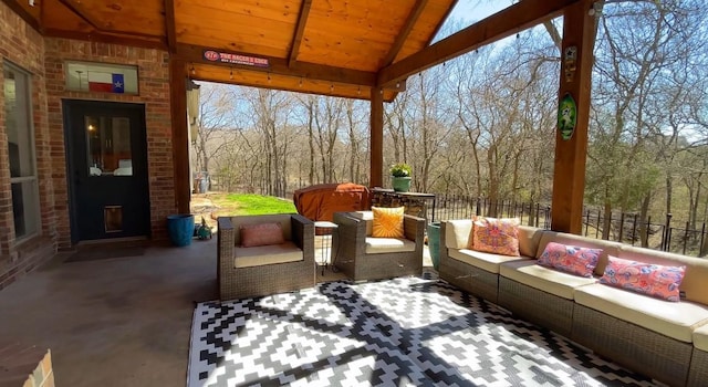 sunroom with vaulted ceiling and wooden ceiling