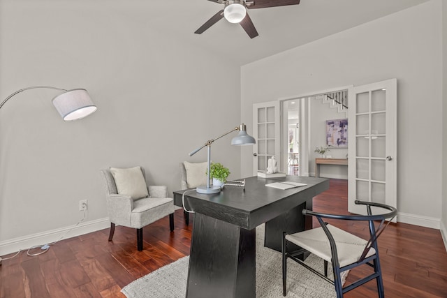 office space with ceiling fan, baseboards, and wood finished floors