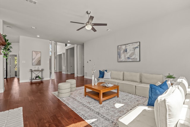 living room with recessed lighting, wood finished floors, visible vents, a ceiling fan, and baseboards