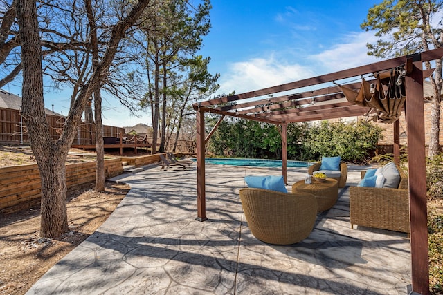 view of patio / terrace featuring a fenced backyard, an outdoor pool, and a pergola