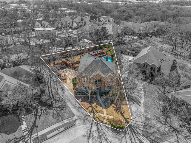 birds eye view of property with a residential view