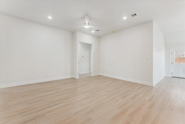 spare room with light wood finished floors, visible vents, baseboards, ceiling fan, and recessed lighting