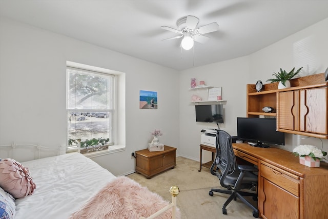 bedroom with baseboards, light carpet, and a ceiling fan