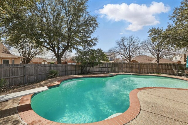 view of swimming pool featuring a fenced in pool and a fenced backyard