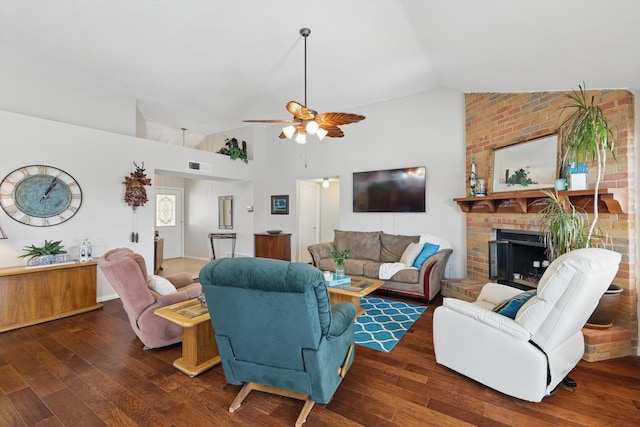 living area featuring visible vents, ceiling fan, vaulted ceiling, and hardwood / wood-style flooring