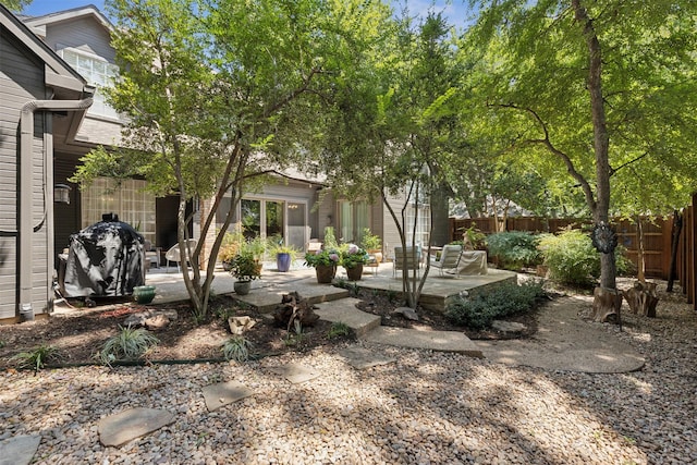 view of yard with a patio area and fence