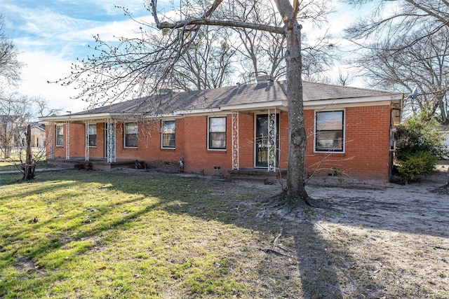 ranch-style house with brick siding, crawl space, and a front lawn