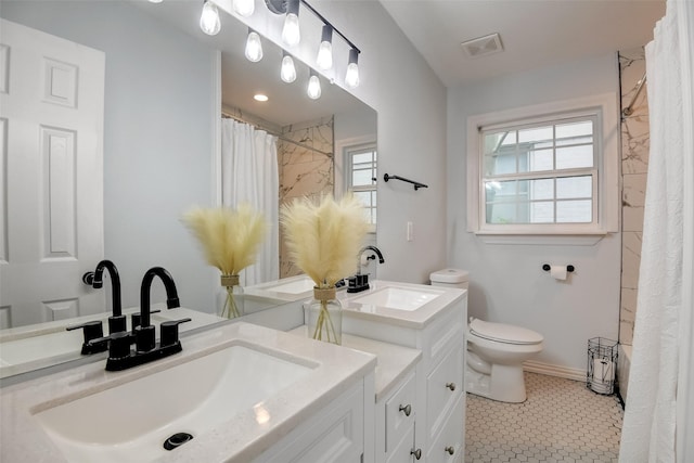 full bath with toilet, visible vents, a shower with shower curtain, and vanity