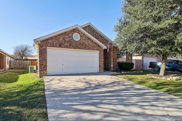 single story home with an attached garage, central AC, brick siding, fence, and concrete driveway