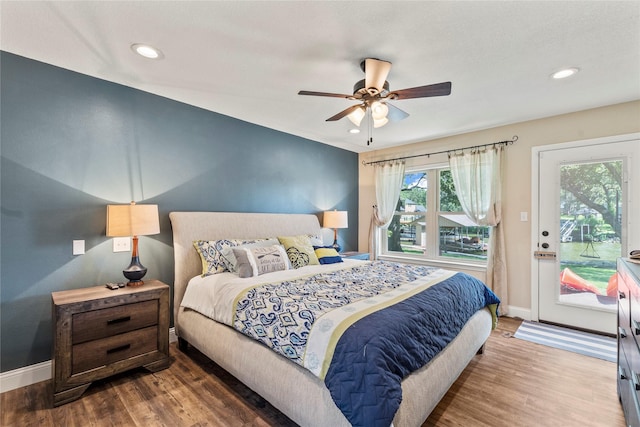 bedroom featuring baseboards, a ceiling fan, wood finished floors, access to exterior, and recessed lighting