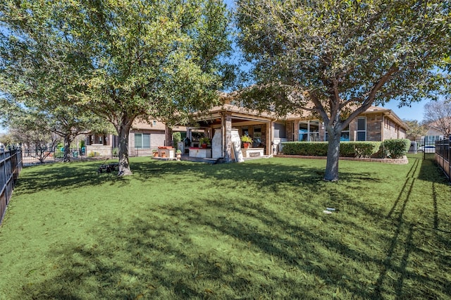 view of yard featuring a patio and a fenced backyard