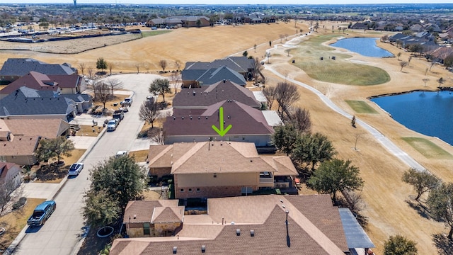 bird's eye view with a residential view, a water view, and golf course view