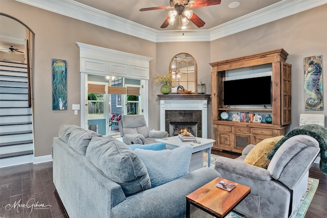 162 Captain Hm Shreve, Shreveport, LA 71115 - living room with ceiling fan, stairway, a fireplace, ornamental molding, and dark wood-type flooring
