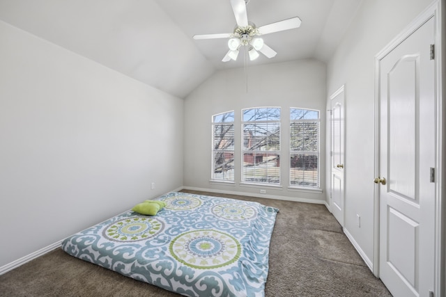 bedroom featuring a ceiling fan, lofted ceiling, carpet flooring, and baseboards