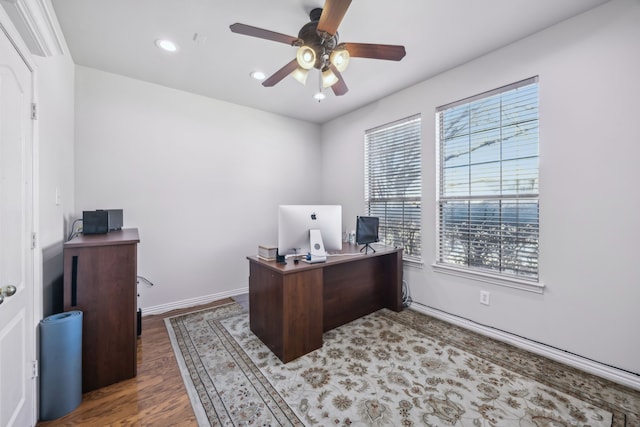 home office with recessed lighting, baseboards, a ceiling fan, and wood finished floors