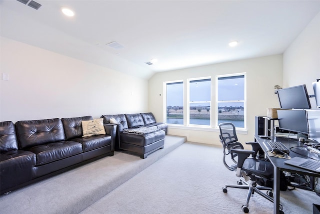 home office with vaulted ceiling, recessed lighting, carpet, and visible vents