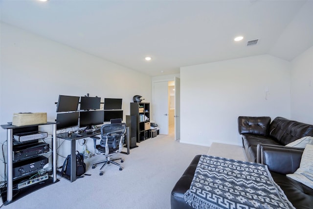 office area featuring visible vents, recessed lighting, carpet floors, baseboards, and vaulted ceiling