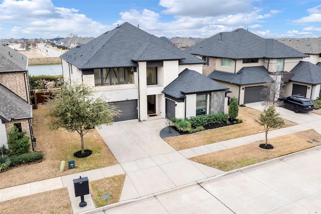 view of front facade featuring stucco siding, a residential view, concrete driveway, a shingled roof, and a garage