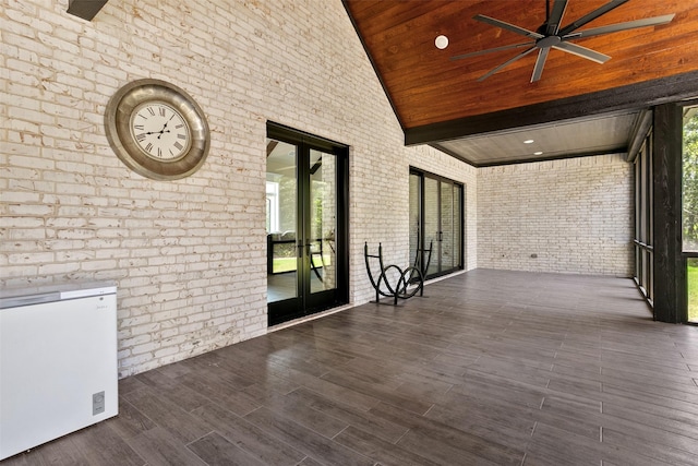 interior space with ceiling fan and french doors