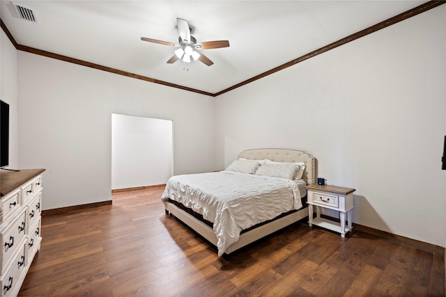 bedroom featuring ceiling fan, baseboards, dark wood-type flooring, and ornamental molding