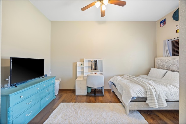 bedroom featuring dark wood-style floors, baseboards, and a ceiling fan