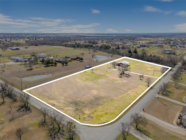 bird's eye view with a rural view