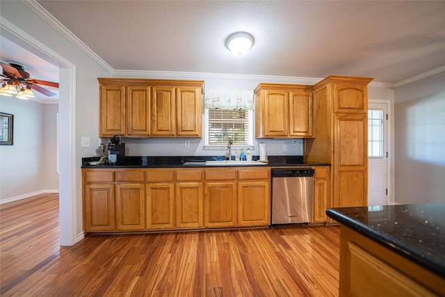 kitchen featuring crown molding, stainless steel dishwasher, brown cabinetry, a sink, and wood finished floors