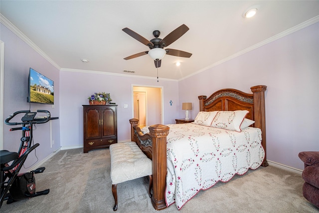 bedroom with baseboards, visible vents, ceiling fan, carpet, and crown molding