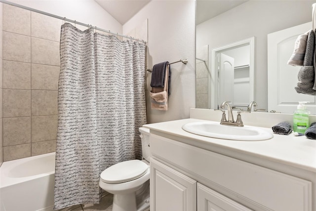 full bath featuring shower / bath combo, vanity, and toilet