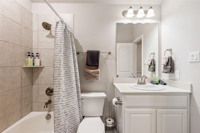 bathroom with vanity, toilet, and shower / bath combo with shower curtain