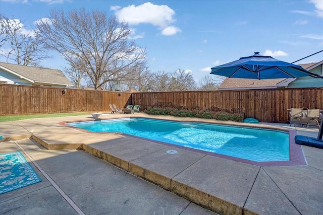 view of pool with a fenced in pool, a patio area, and a fenced backyard