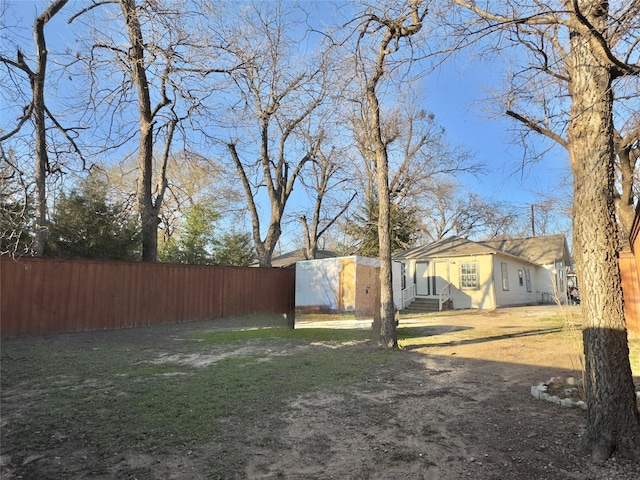 view of yard with fence