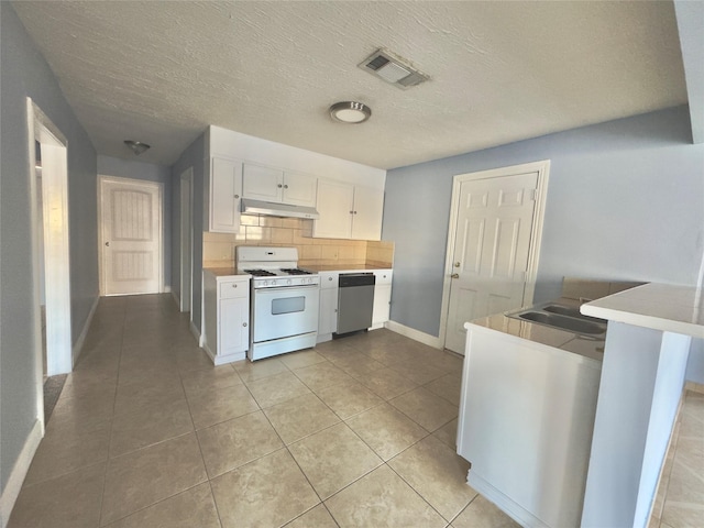 kitchen featuring visible vents, stainless steel dishwasher, white cabinetry, white range with gas stovetop, and under cabinet range hood