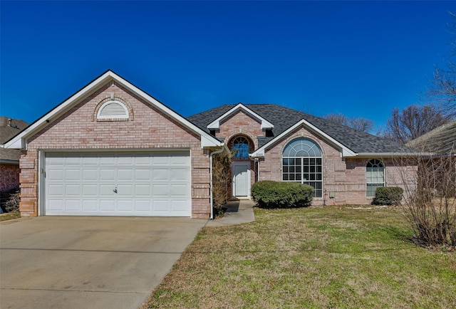 ranch-style house featuring an attached garage, brick siding, driveway, and a front lawn