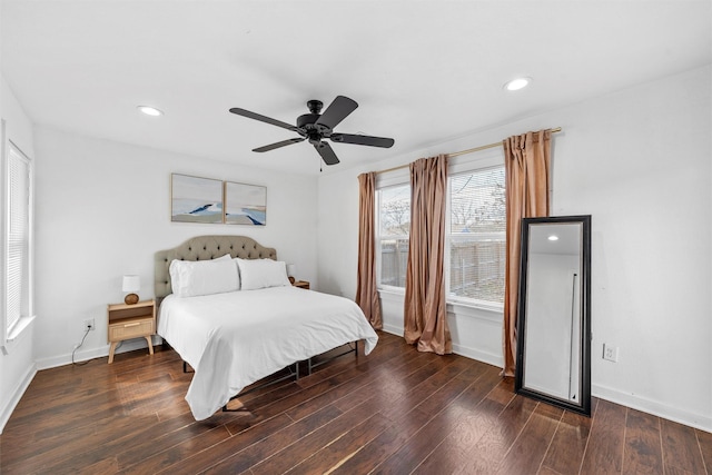 bedroom featuring recessed lighting, hardwood / wood-style flooring, and baseboards