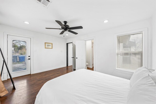 bedroom with dark wood finished floors, recessed lighting, visible vents, access to outside, and baseboards