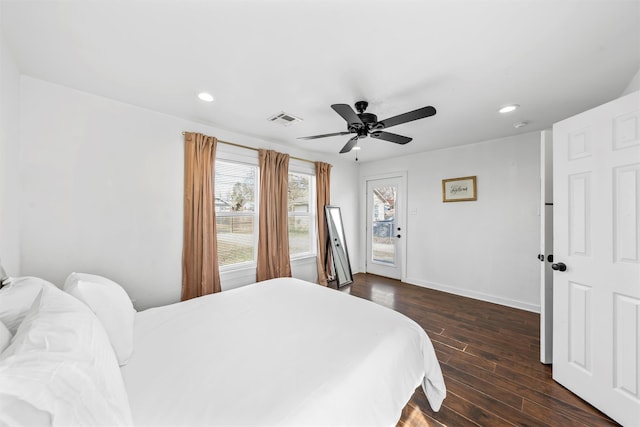 bedroom featuring dark wood-style floors, recessed lighting, visible vents, and baseboards