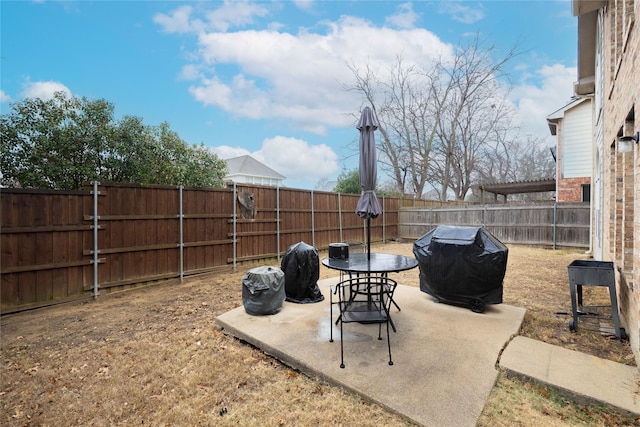 2509 Cross Haven Dr, Flower Mound, TX 75028 - fenced backyard featuring grilling area and a patio
