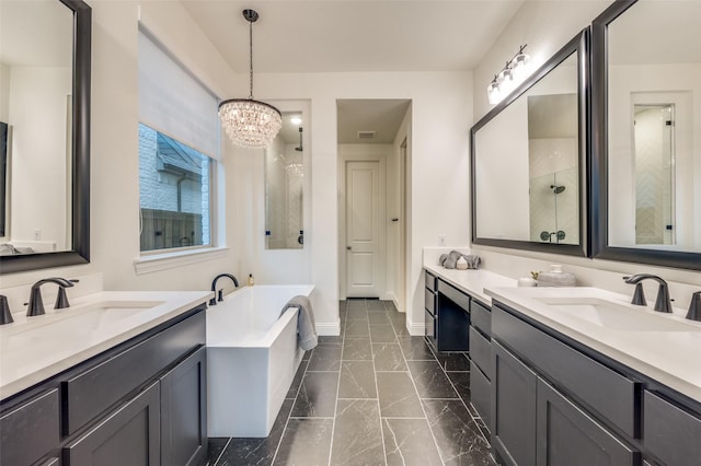 full bathroom with a garden tub, a walk in shower, baseboards, and a sink