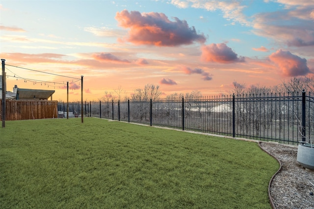 view of yard with fence