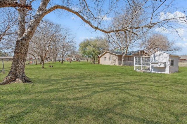 view of yard with fence