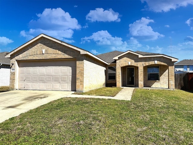 view of front of house featuring a garage, concrete driveway, brick siding, and a front yard