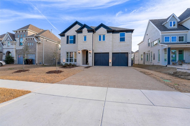 traditional-style home with an attached garage, aphalt driveway, and brick siding