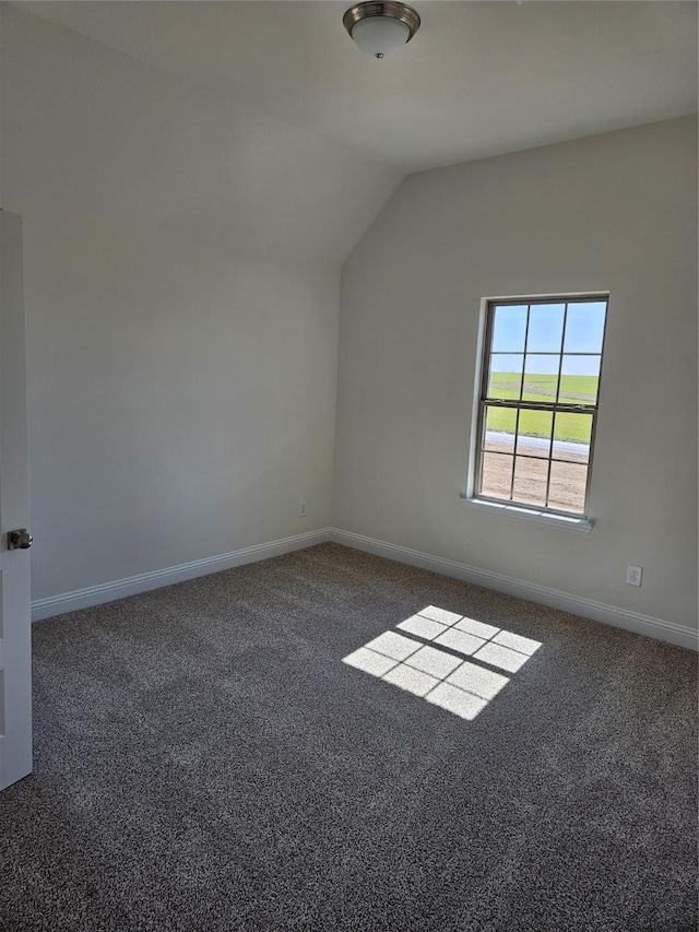 bonus room with carpet, lofted ceiling, and baseboards